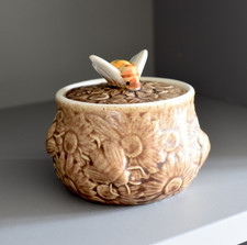 Secla Pottery lidded pot with embossed flowers and bees and a moulded bee finial