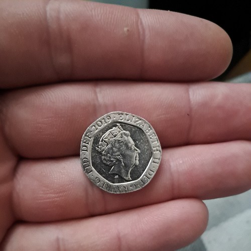 Pence coin with queens - pence,