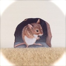 Adorable Mouse in Hole Wall