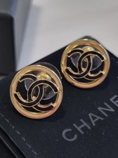 Chanel stud earrings, 22 collection, vintage gold and black enamel, new.