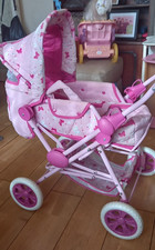 Pink dolls pushchair/pram