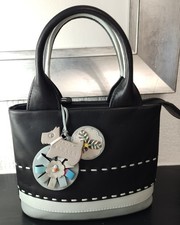 Radley black all leather mini bag. excellent condition, bag charm,cotton dustbag