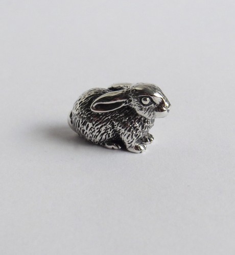 Rabbit crouched figurine