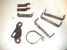 Triumph Stag Rear light brackets section of rear light & time clock brackets.