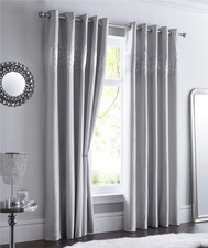Grey curtains lined eyelet