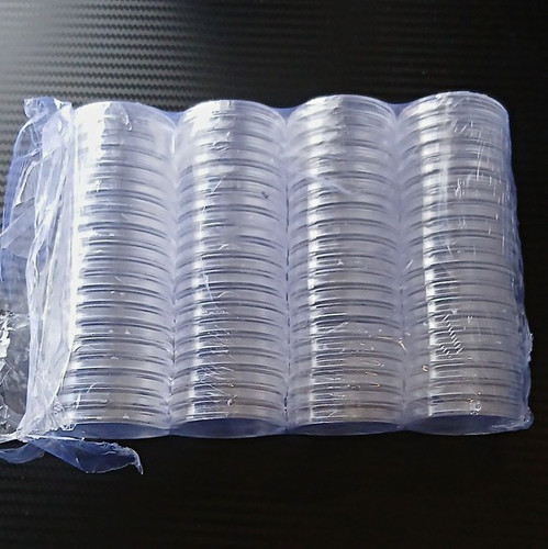 Clear plastic coin capsules - coin,