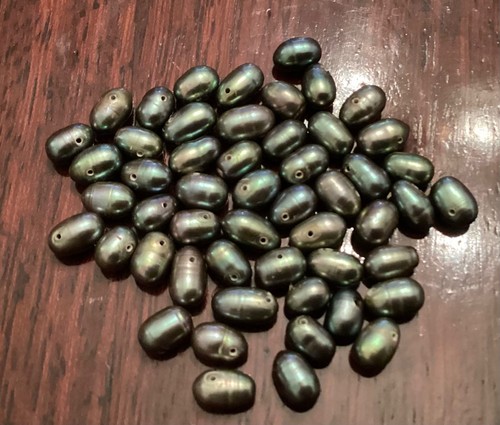 Iridescent green keshi - iridescent, or