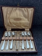 "Set" of six silver-plated coffee spoons + sugar tongs in case