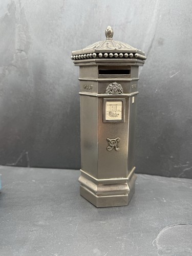 Silver colour post office - post,