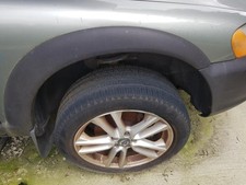 Volvo XC70 Mk1 FL 05-07 OS Drivers Right Front Brown Wheel Arch Trim A68633