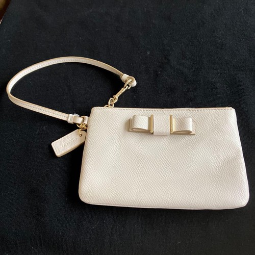 Coach white bow wristlet pouch - white,