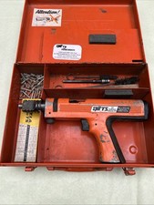 Spit TS Nail Gun In Case Some Yellow Cartridges & 25mm Nails Used.