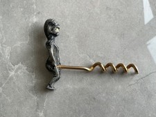 Rude Corkscrew with glistening white stone eyes