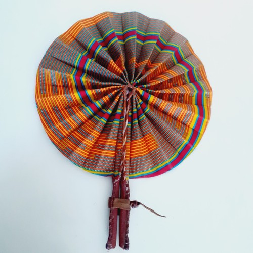 African kente folding - kente, leather