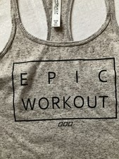 Ladies Uniquely Lorna Jane . Work Out Top Size Xs. Grey. Good Condition.