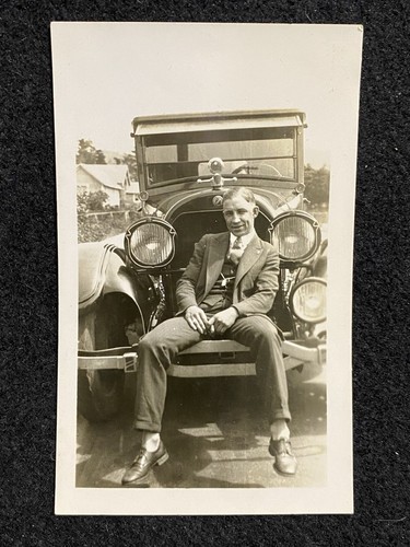 Man sitting cadillac - man,