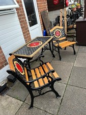 Cast Iron Table And Two Chairs