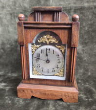 BADISCHE UHRENFABRIK Small Wooden Table Clock with Bell Alarm. Circa 1920s