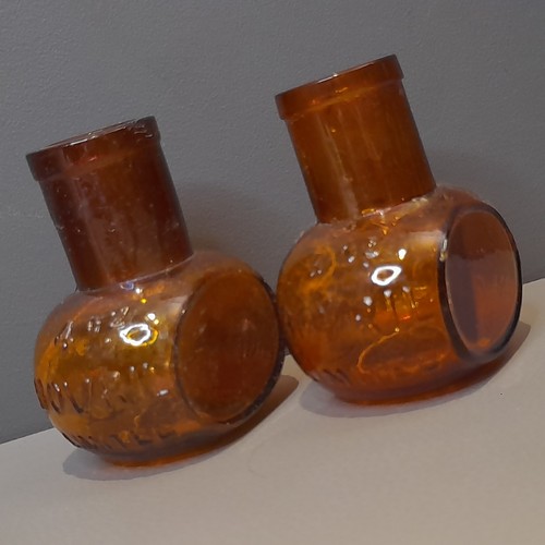 Pair antique amber bovril - pair,