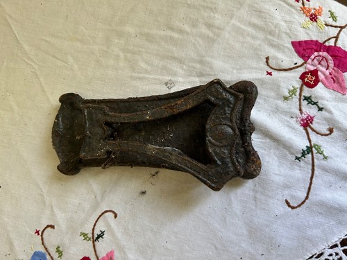Antique cast iron door knocker
