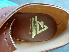 totectors, brown steel toe cap brogues.