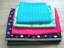 Vintage fabric remnants bundle, various sizes, mostly polyester type material.