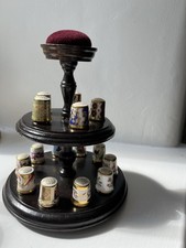 Set Of 15 Royal Daulton Thimbles, On A Wooden Stand With Pin Cushion At The Top