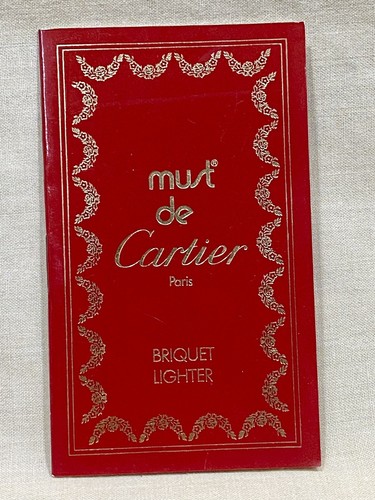 Must cartier lighter - de,