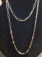Two Gold Tone M&S Chains Can