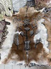 Hand Carved Bulls Skull Goat Hides