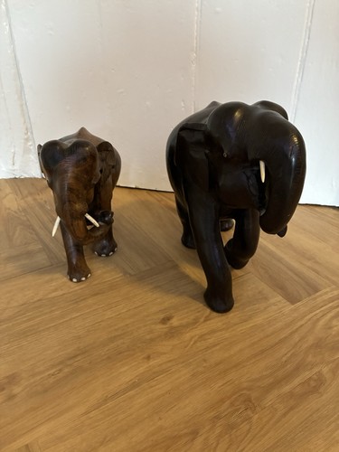 Pair hand carved wooden - of,