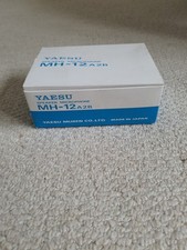 Yaesu MH-12 A2B Speaker Microphone Plus Earphone and leaflet.
