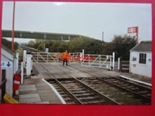 PHOTO  STEWARTBY CROSSING KEEPER OPENS THE GATES 1993