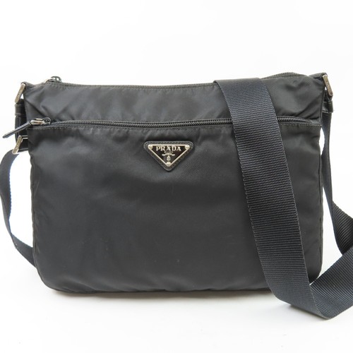 Prada triangle logo - triangle,