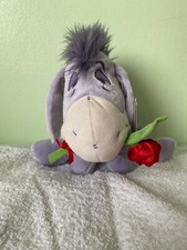 Disney Eeyore’s Little Moments holding rose soft plush with tag