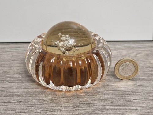 Amber coloured - r,