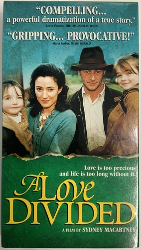 Love divided 2002 - divided,