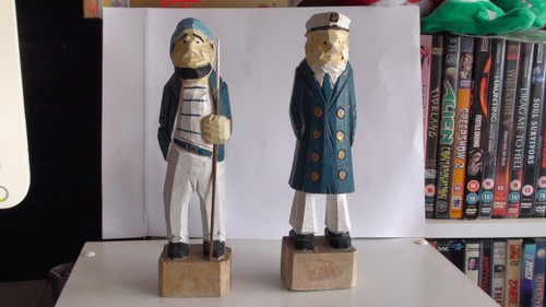 Two carved nautical - two, wooden
