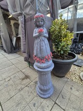 Lady On A Large Plinth