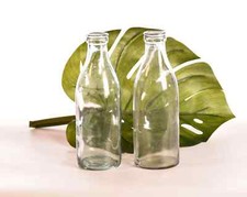 Pair of vintage milk bottles