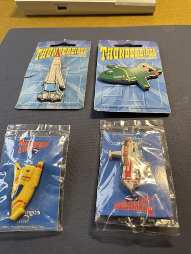 Four vintage thunderbirds - vintage, pin