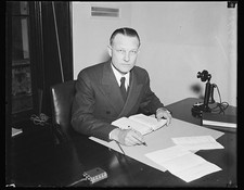 Photo:Businessman at Desk