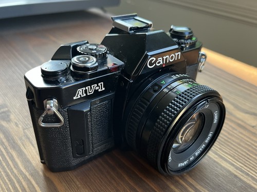 Canon all black - av-1,