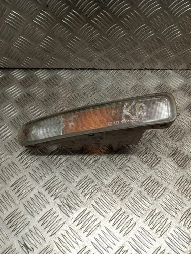 Mazda 323 front left - f,