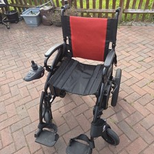 Electric wheel chair - in, very