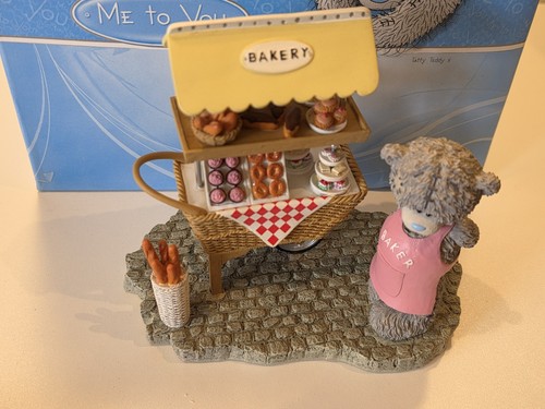 You bear figurine - to,