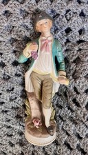 Vintage Figure Of A Young Man With Fruit