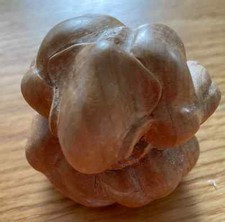 Small hand carved wooden yogi