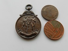 A VINTAGE BRONZE MEDAL/FOB, Q.E.S. CREDITON "C" 100 YARDS, 1938. J.L. STARK.