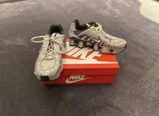 Grey and white Nike shox size